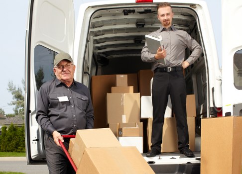Professionals clearing a flat in Addlestone