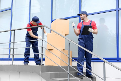 Flat clearance professionals removing furniture from a Chesham flat