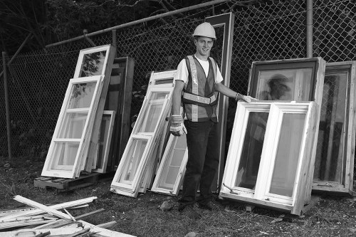 Professional flat clearance team removing furniture from a Downham flat