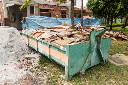 Professional team clearing a flat in North Harrow