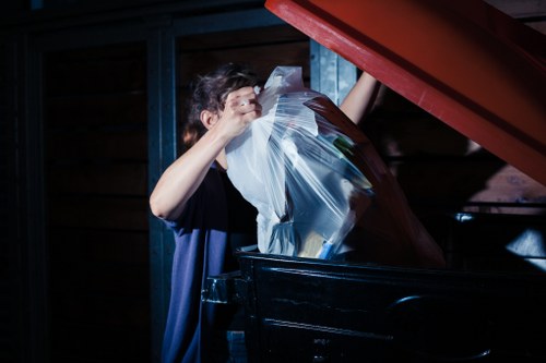 Professional flat clearance team at work in Perivale