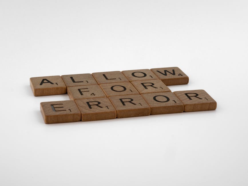 A close-up photograph of wooden Scrabble tiles arranged on a plain white surface spelling out the words 'ALLOW' and 'ERROR'. The tiles have a natural wood finish with black letter printing, and some f